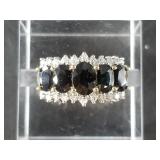 14kt Gold and sapphire ring size 7, containing 2.2