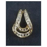 14kt Gold and diamond pendant, purchased for $436,