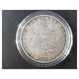 Morgan silver dollar, 1878 7 tail feathers, strong