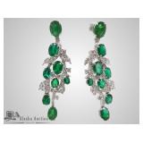 Emerald and diamond pair of earrings set in platin