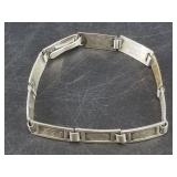 Sterling silver and gold bracelet, featuring diffe