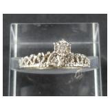 10Kt Gold and diamond ring, size 9 1/2 with a tota