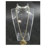 10kt Gold, necklace with waffle pendant, originall