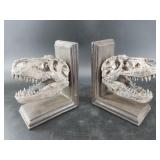 Pair of resin bookends depicting T-Rex skulls