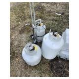 Lot with several propane tanks and a propane tank