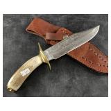 Raindrop Damascus bladed hunting knife with brass