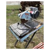Lot with a Baldor tile saw and 2 folding metal saw
