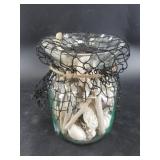 Jar of sea shells