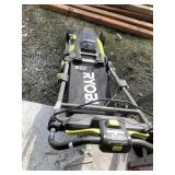 Ryobi 40 Volt lithium electric lawnmower with trim