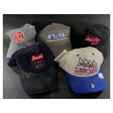 Several baseball caps