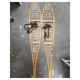 Pair of wood snow shoes with contemporary bindings