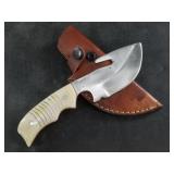 Skinning knife with leather sheath  7.5" long
