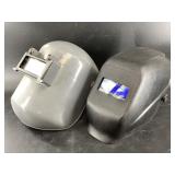 Two welding helmets