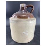 One quart whiskey crock in good condition