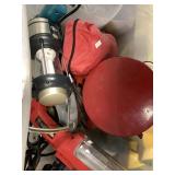 Assortment of power tools, first aid kit, a small