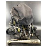 Backpack full of gear, fish thumper, a Hilti model