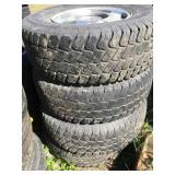 Set of 4 tires on Chevy 6 lugs wheels size 265/75/