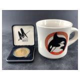 1991 Fur Rondy coffee mug and corresponding bronze