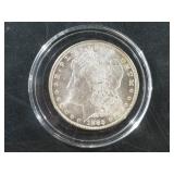 Morgan Silver dollar:  1885 AU50 or better