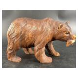 Detailed wood carving of an Alaskan grizzly bear h