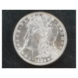 Morgan Silver dollar:  1886 AU50 or better