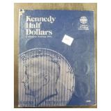 Partial Kennedy half dollar folder with 2  1964 an