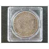 Morgan Silver dollar:  1879 with 7 tail feathers
