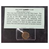 Ancient Greek bronze coin,, heavily worn, helmeted