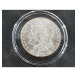 Morgan Silver dollar:  1884 O AU50 or better