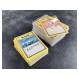 Large stack of Pokï¿½mon Trainer cards