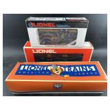Three new in box Lionel model train cars