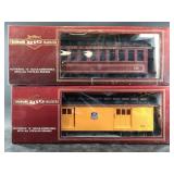 2 Large metal train cars, new in box, both are Bac