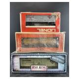 Two vintage Lionel train cars with box, and an add