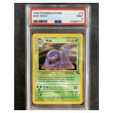 Fossil Muk Holographic in a PSA 9 Pokï¿½mon card
