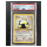 First edition  non holo Snorlax in a PSA 8