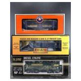 Three new in box model train cars: Lionel, Rail Ki