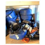 Lot with a variety of fire hoses etc.