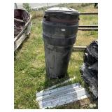 Several trash cans and pieces of aluminum