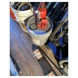Lot with concrete stakes, bottle jack without bar,
