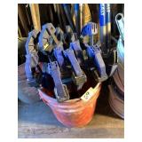 Bucket full of clamps