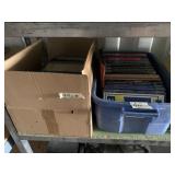 Two boxes of books mostly vehicle manuals