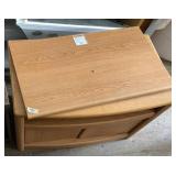 Entertainment stand with swivel top for changing T