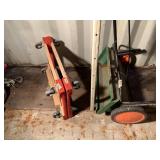 Lot with 2 furniture dollies and a turf spreader