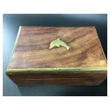 Lovely brass and mahogany box with a dolphin on to