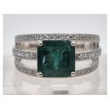 Emerald and diamond ring set in platinum, emerald