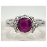 Natural ruby and diamond ring set in platinum, cen
