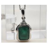 Emerald and diamond necklace, center stone is 3.27