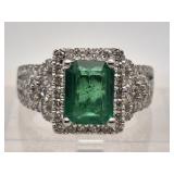 Emerald and diamond ring set in platinum,  emerald