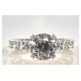 18Kt white gold and diamond ring, center stone is