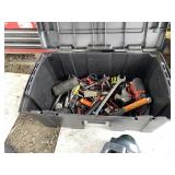 Plastic tote with various tools, including wrenche
